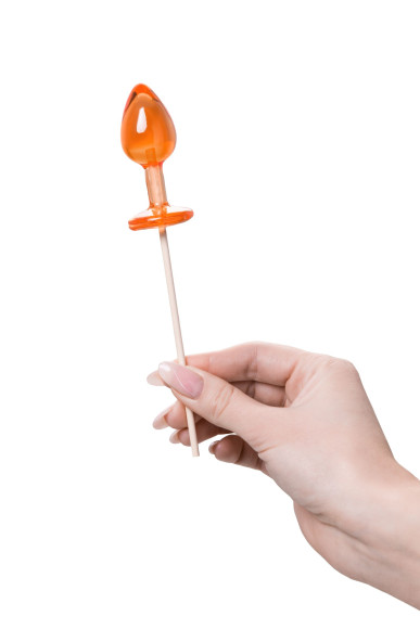 Оранжевый леденец в форме анальной пробки со вкусом амаретто - 29 гр.