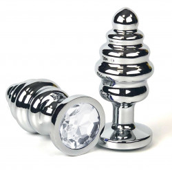 Серебристая ребристая анальная пробка с прозрачным кристаллом - 7 см.