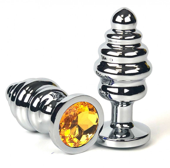 Серебристая ребристая анальная пробка с оранжевым кристаллом - 8 см. Серебристая ребристая анальная пробка с оранжевым кристаллом - 8 см.