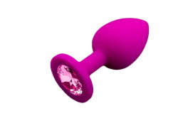 Маленькая розовая силиконовая пробка с розовым кристаллом - 7,5 см. Маленькая розовая силиконовая пробка с розовым кристаллом - 7,5 см.