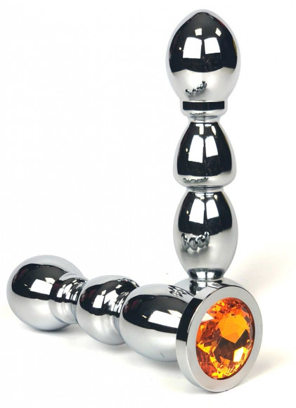 Серебристая анальная ёлочка с оранжевым кристаллом - 13 см. Серебристая анальная ёлочка с оранжевым кристаллом - 13 см.