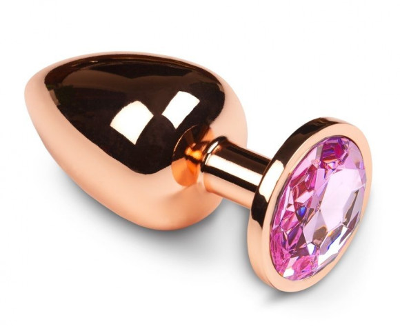 Большая золотистая анальная пробка с розовым кристаллом - 8,5 см. Большая золотистая анальная пробка с розовым кристаллом - 8,5 см.