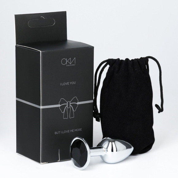 Серебристая анальная втулочка с черным кристаллом - 7 см. Серебристая анальная втулочка с черным кристаллом - 7 см.