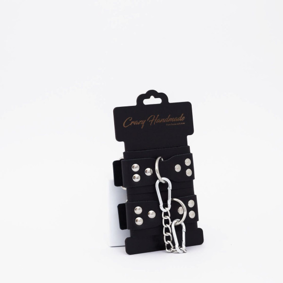 Черные кожаные оковы с регулируемыми ремешками