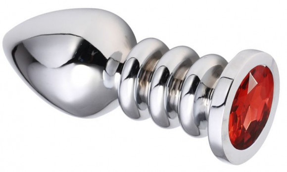 Серебристая анальная пробка на рельефной ножке с красным кристаллом - 9 см. Серебристая анальная пробка на рельефной ножке с красным кристаллом - 9 см.